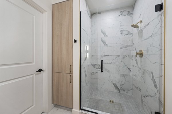 Modern bathroom with sleek fixtures at Moontower PHX Apartments