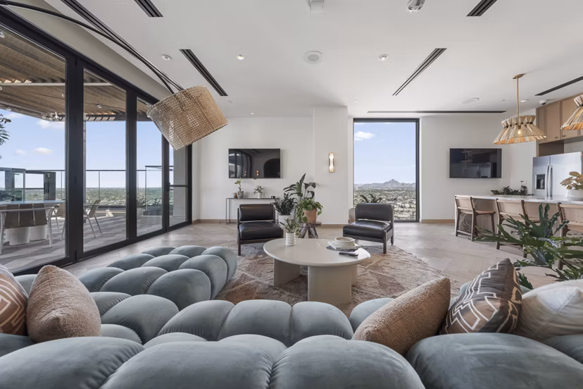 Stylish clubhouse featuring modern seating and entertainment options at Moontower PHX Apartments