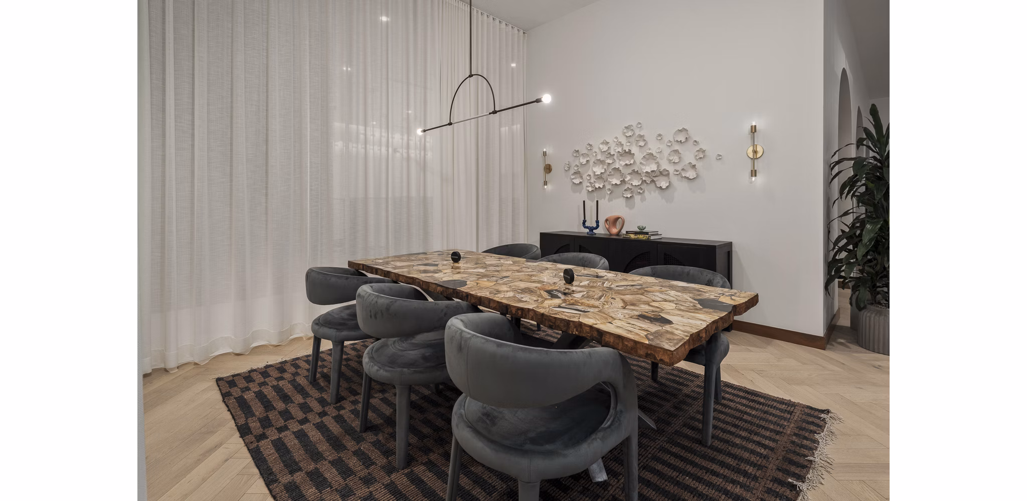 Clubhouse featuring modern decor and communal seating at Moontower PHX Apartments, luxury living in Phoenix