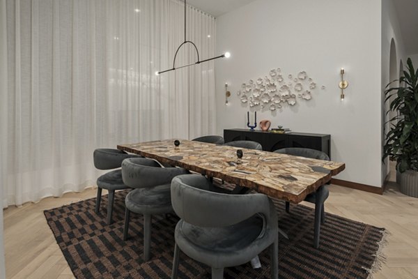 Clubhouse featuring modern decor and communal seating at Moontower PHX Apartments, luxury living in Phoenix