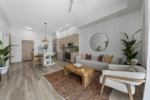 Spacious living room with modern furnishings in Moontower PHX Apartments luxury residences