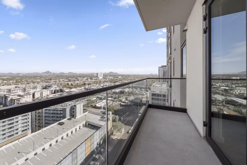 Spacious patio with modern furniture at Moontower PHX Apartments