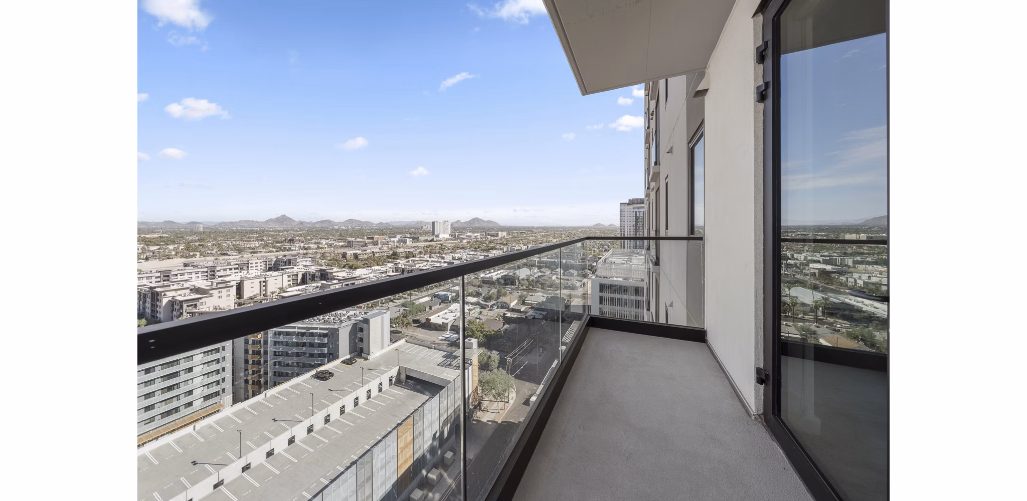 Spacious patio with modern furniture at Moontower PHX Apartments