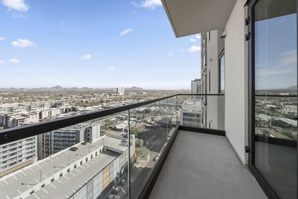Spacious patio with modern furniture at Moontower PHX Apartments