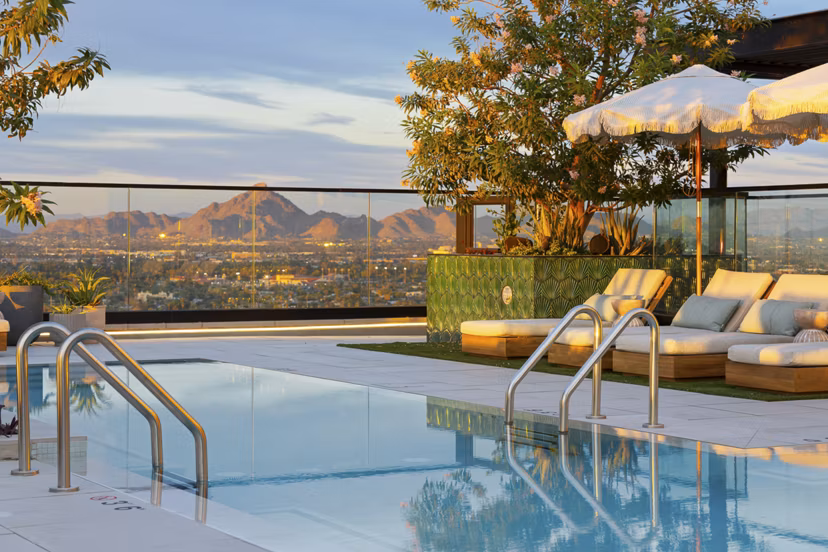Rooftop pool with skyline views at Moontower PHX Apartments