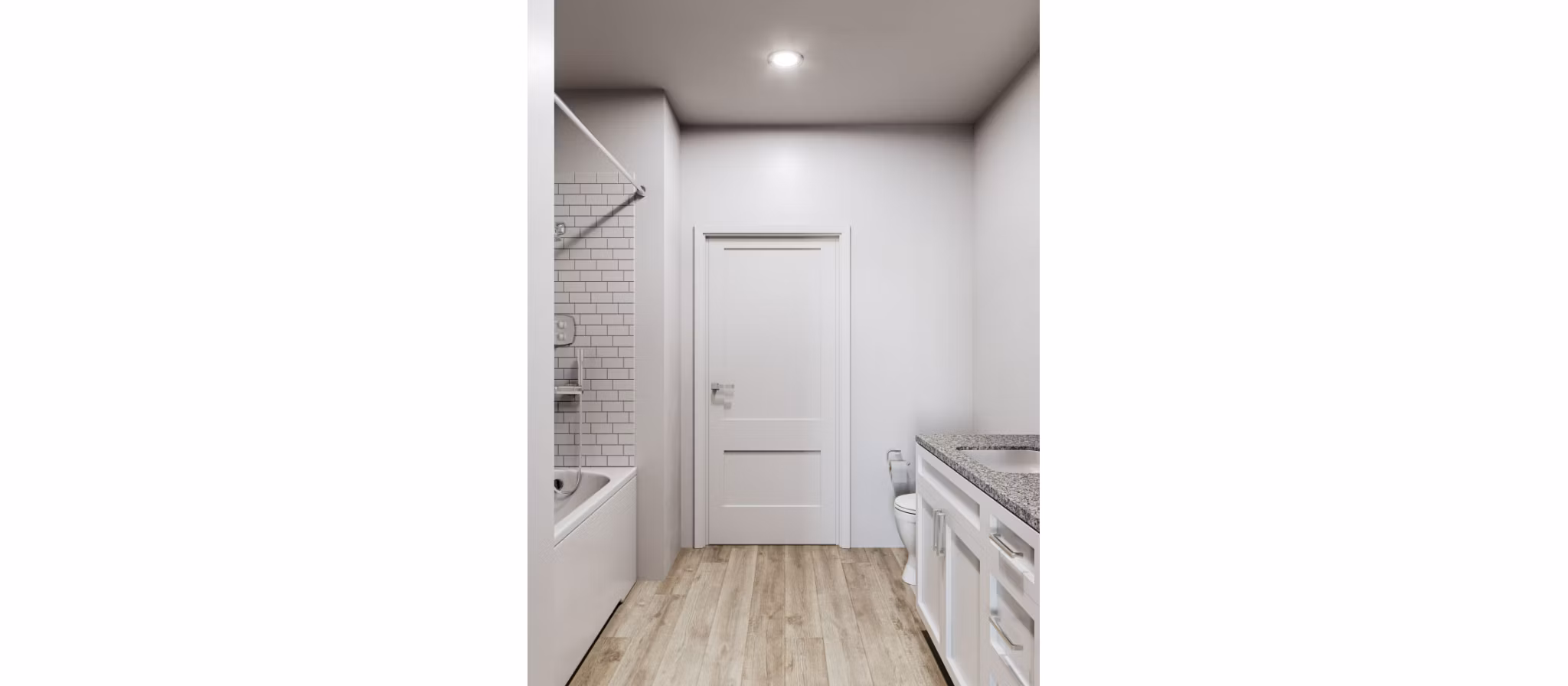 Modern bathroom with sleek marble countertops and chrome fixtures in The Whitby luxury apartments