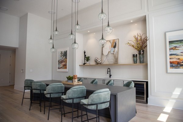 Clubhouse featuring elegant lounge seating at The Whitby luxury apartments in vibrant urban setting