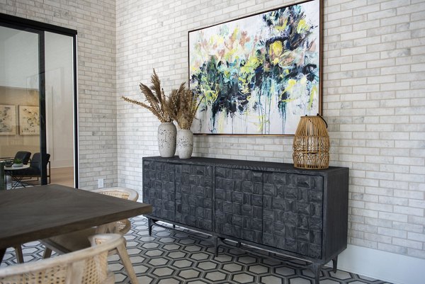 Modern clubhouse featuring sleek design and ample seating at The Whitby luxury apartments