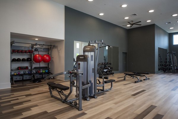State-of-the-art fitness center at The Whitby apartments with modern equipment for an active lifestyle