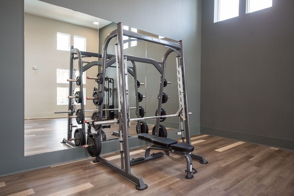 Fitness room featuring modern equipment in The Whitby luxury apartments