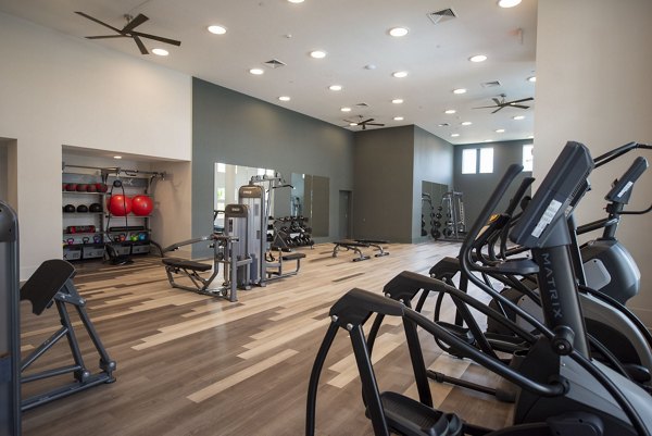 Modern fitness center with state-of-the-art equipment at The Whitby, luxury apartments