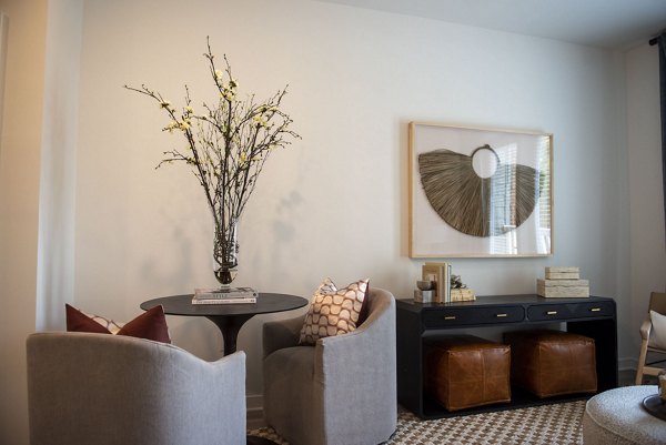 Spacious living room with modern furnishings in The Whitby luxury apartments
