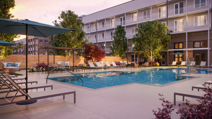 Inviting poolside lounge area at The Whitby luxury apartments, perfect for relaxing and socializing