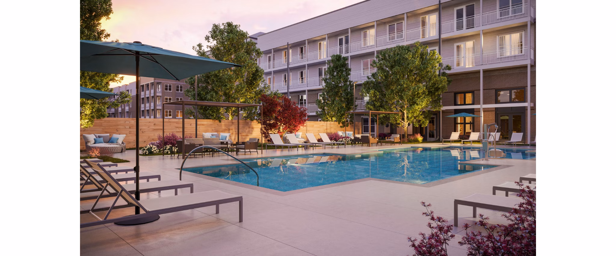 Inviting poolside lounge area at The Whitby luxury apartments, perfect for relaxing and socializing