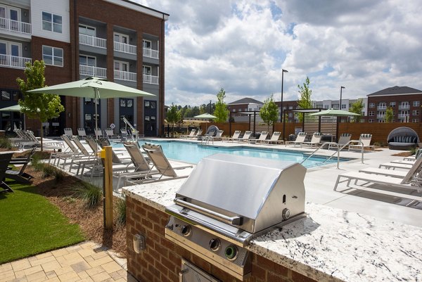 Modern fitness center with cardio and strength equipment at The Whitby luxury apartments