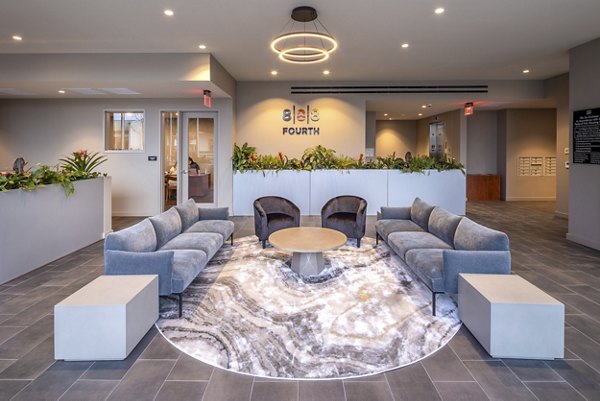 Modern lobby with sleek furnishings at 888 4th Street Apartments, showcasing contemporary design and comfort
