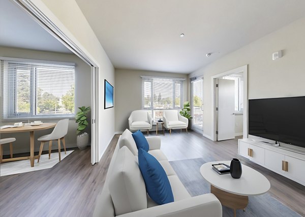 Spacious living room with modern decor in 888 4th Street Apartments