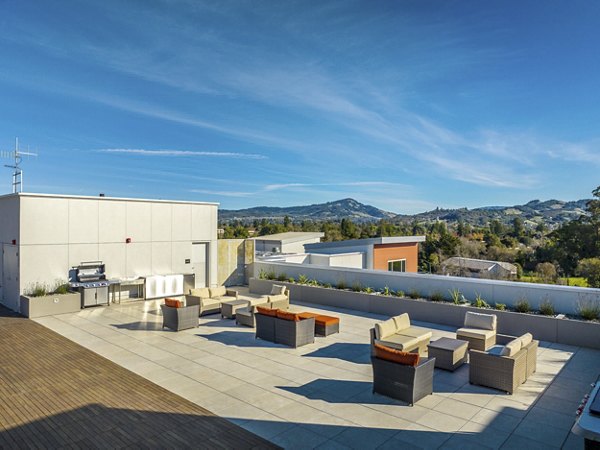 Modern patio area with comfortable seating at 888 4th Street Apartments, offering a relaxing outdoor space for residents
