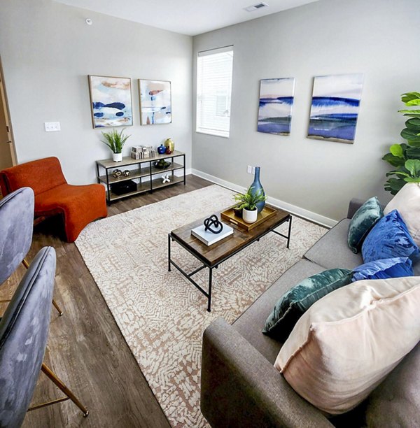 Living room with modern decor and natural light at Vestara 72 Apartments luxury apartments