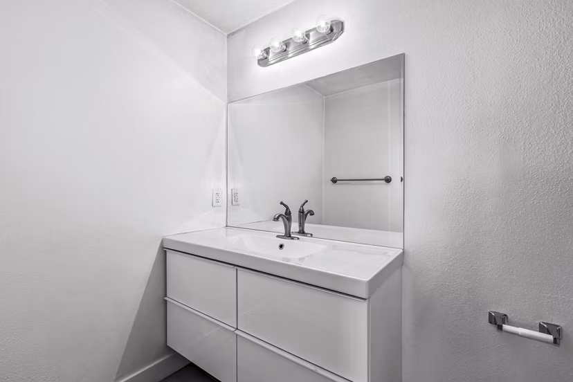 Bathroom with modern fixtures and sleek vanity in Cahuenga Heights Apartments