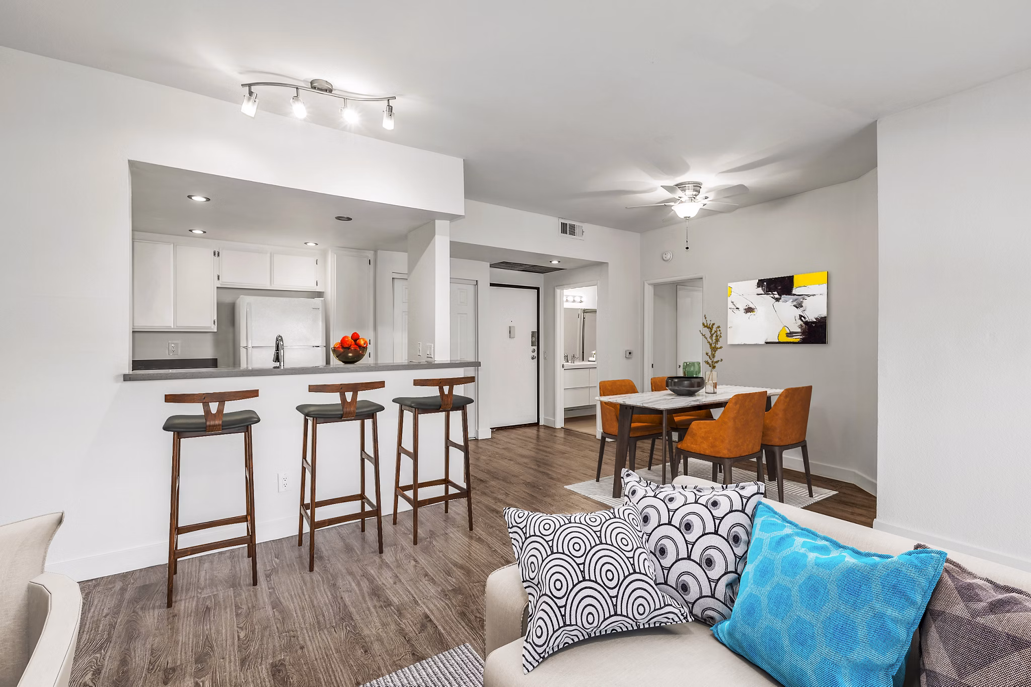 Inviting entrance and stylish dining room at Cahuenga Heights Apartments, featuring modern decor and elegant fixtures