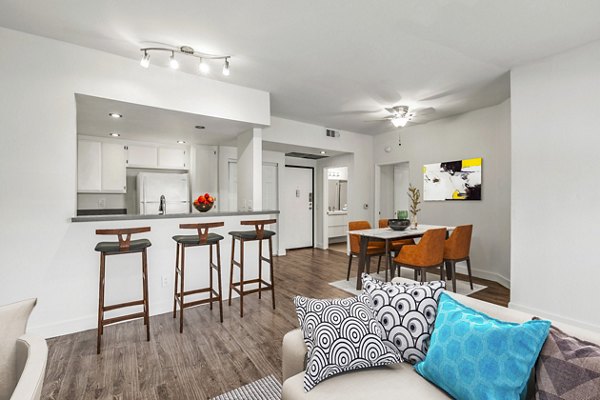 Inviting entrance and stylish dining room at Cahuenga Heights Apartments, featuring modern decor and elegant fixtures