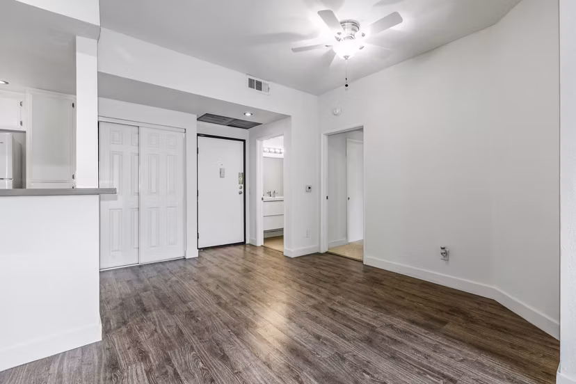 Entrance dining area with modern decor at Cahuenga Heights Apartments, featuring stylish dining set and elegant lighting