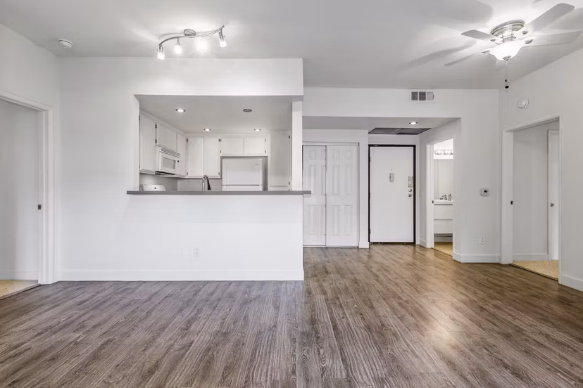 Spacious living room with modern furnishings in Cahuenga Heights Apartments