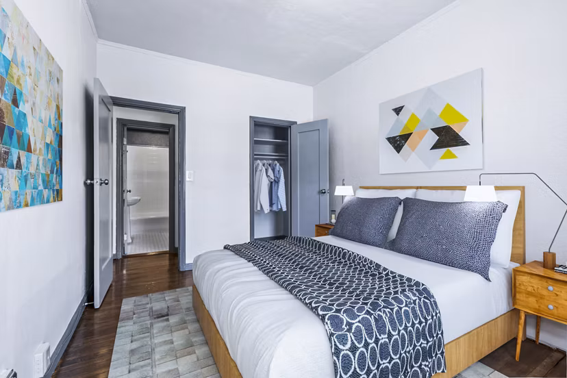 Inviting bedroom with modern decor at Del Mor Apartments, luxury living in Greystar community