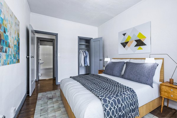 Inviting bedroom with modern decor at Del Mor Apartments, luxury living in Greystar community
