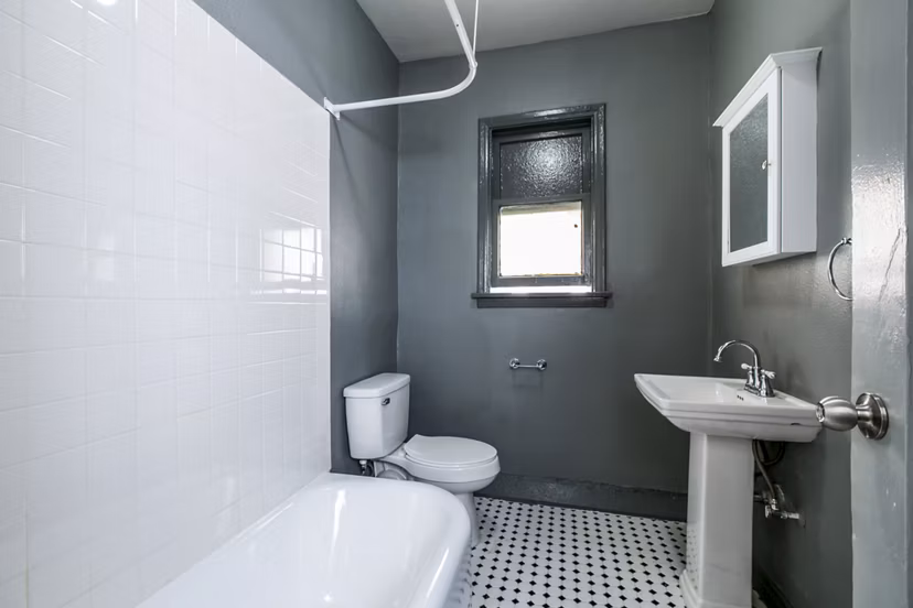 Modern bathroom with sleek fixtures at Del Mor Apartments, Greystar luxury apartments in a convenient location