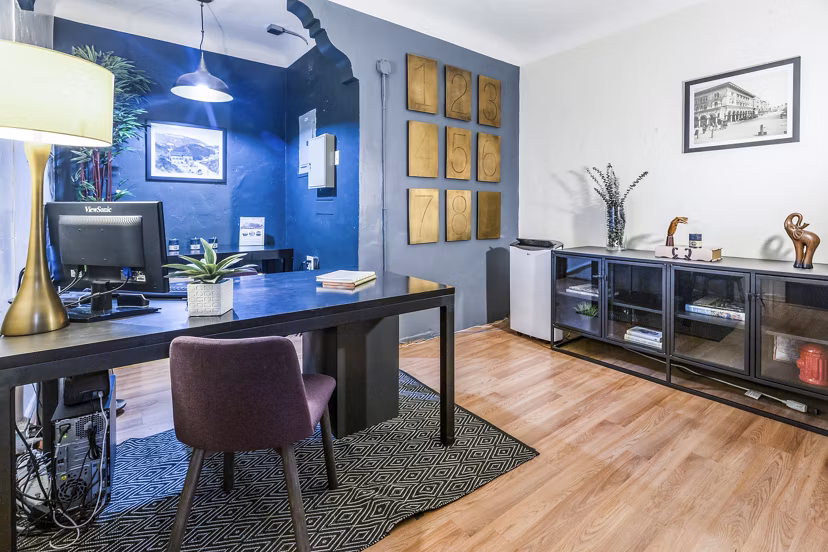 Elegant clubhouse and leasing office at Del Mor Apartments, featuring modern design and community space for residents