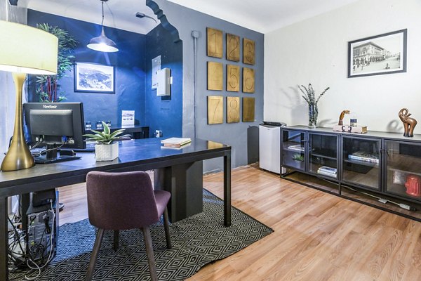 Elegant clubhouse and leasing office at Del Mor Apartments, featuring modern design and community space for residents