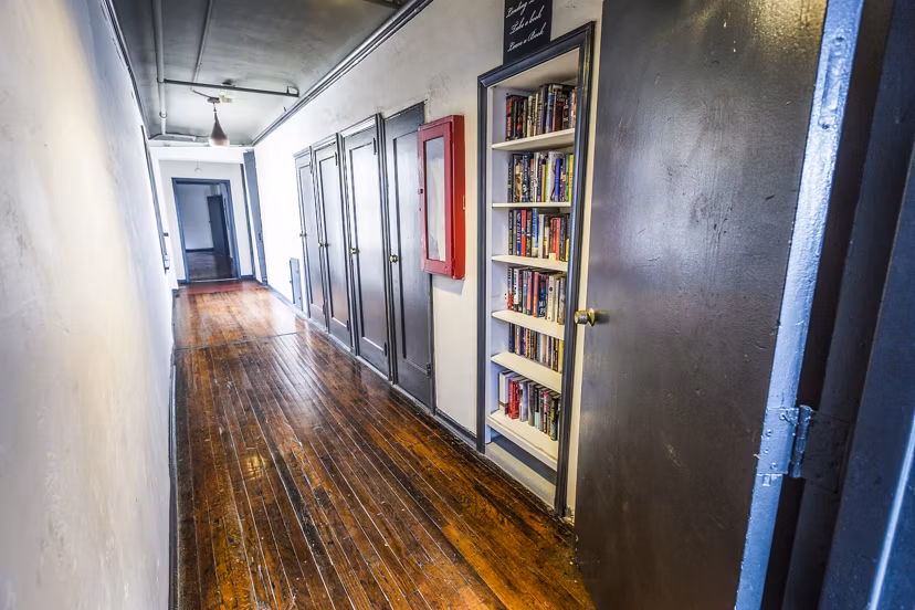 Modern clubhouse hallway with stylish decor at Del Mor Apartments