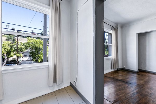 Bright living room with modern decor at Del Mor Apartments