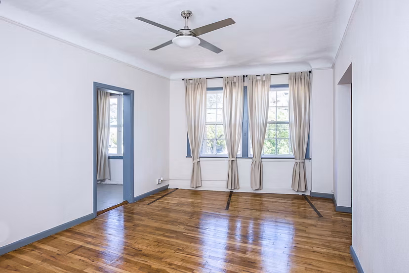 Elegant living room with designer furnishings at Del Mor Apartments