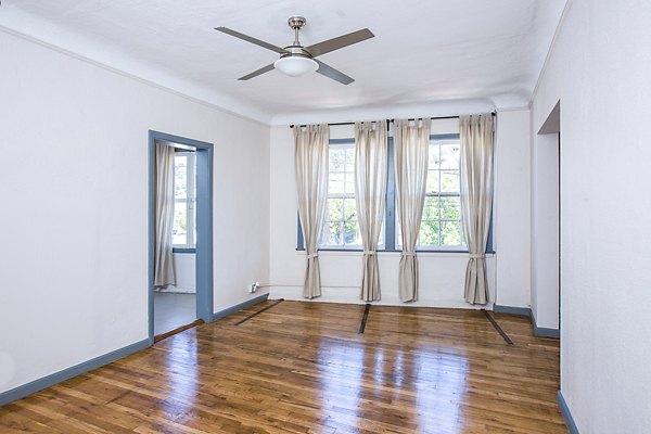 Elegant living room with designer furnishings at Del Mor Apartments