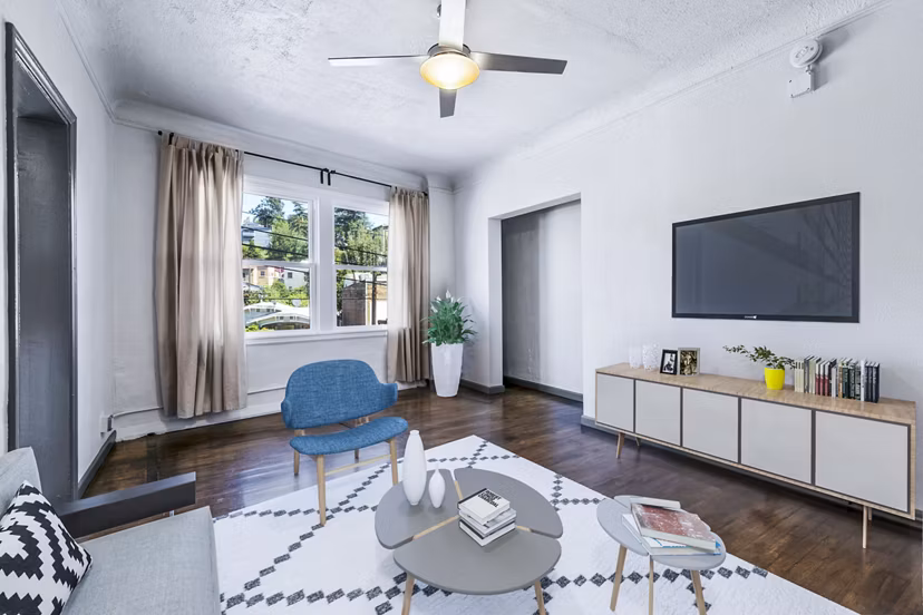 Elegant living room with modern furnishings at Del Mor Apartments