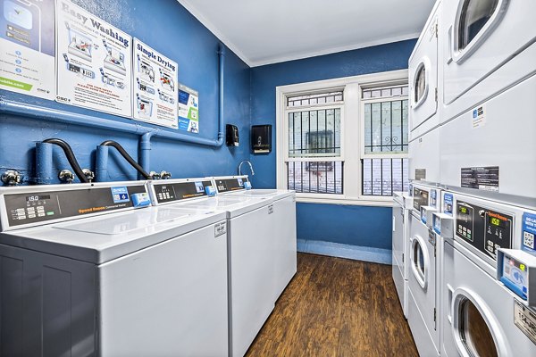 Laundry facility with state-of-the-art machines at Del Mor Apartments, providing convenient and efficient services for residents