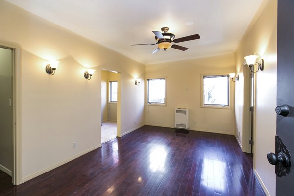 Spacious living room with contemporary furnishings in Delta Apartments