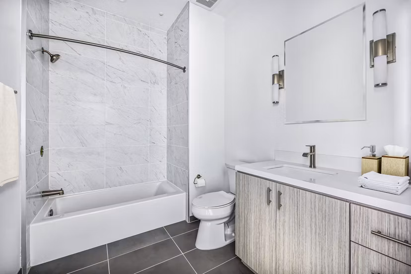 Luxurious bathroom with modern fixtures at Edendale Crossing Apartments