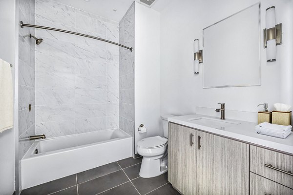 Luxurious bathroom with modern fixtures at Edendale Crossing Apartments