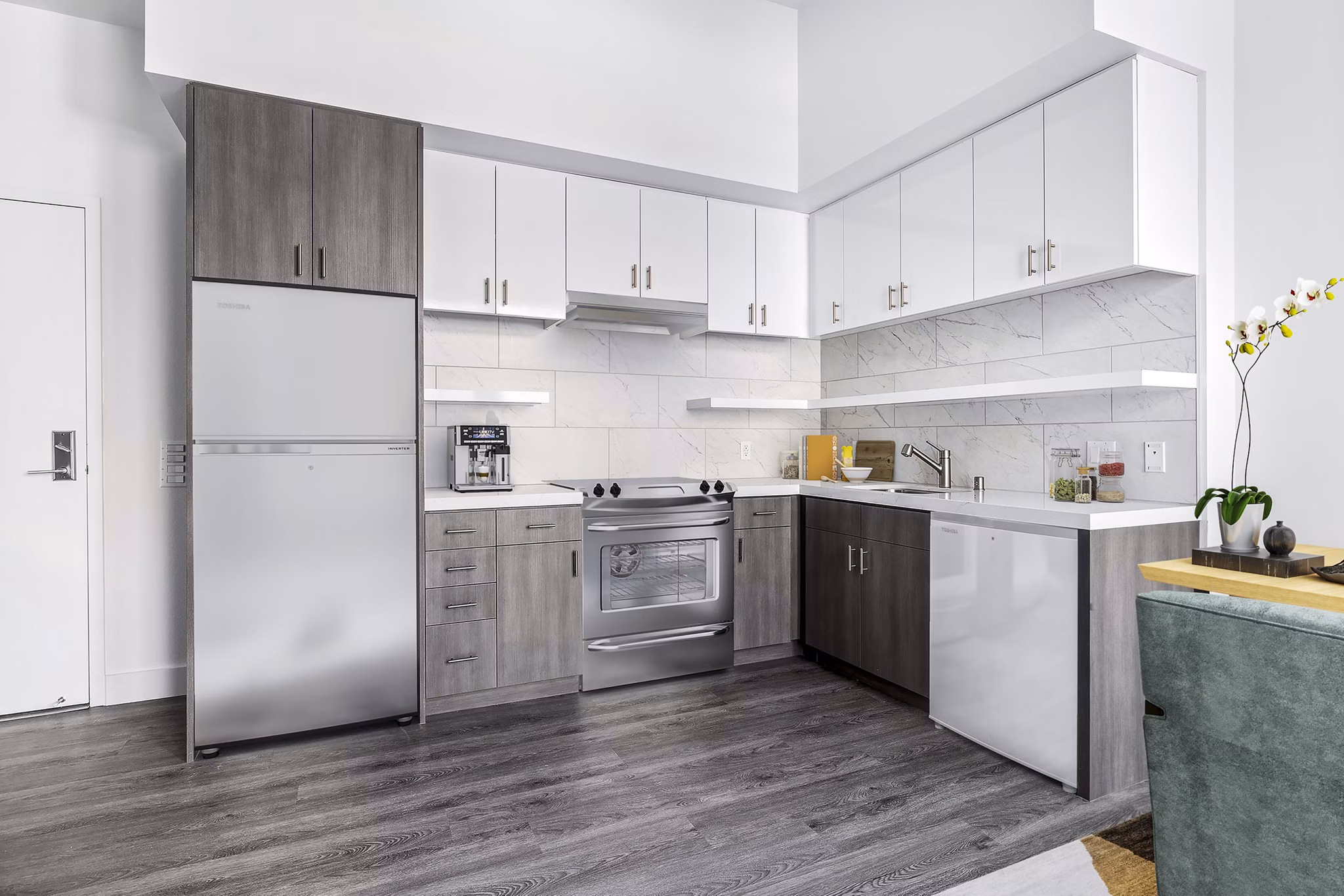 Modern kitchen with stainless steel appliances in Edendale Crossing Apartments