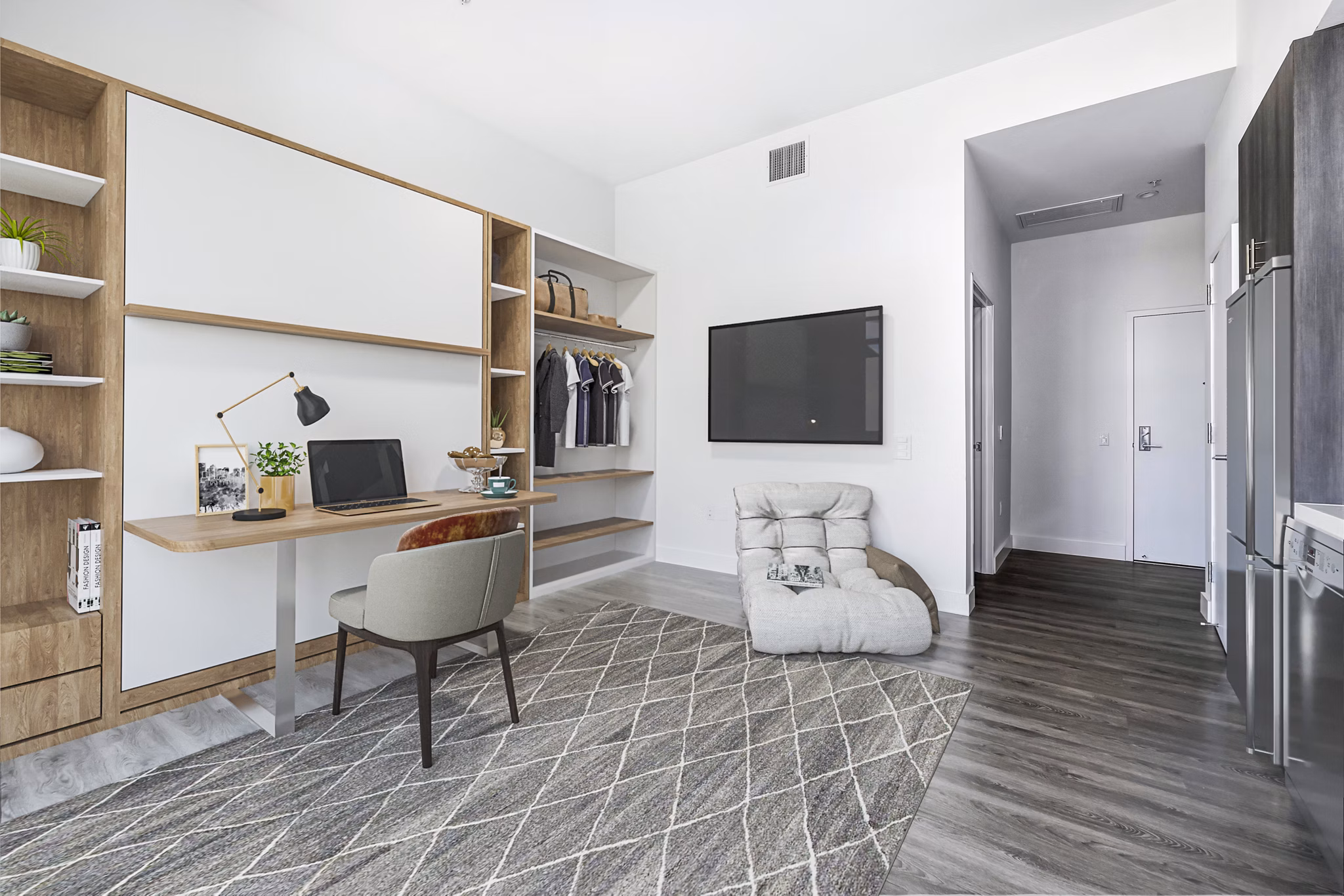 Studio living room with versatile home office at Edendale Crossing Apartments, showcasing modern luxury apartment design