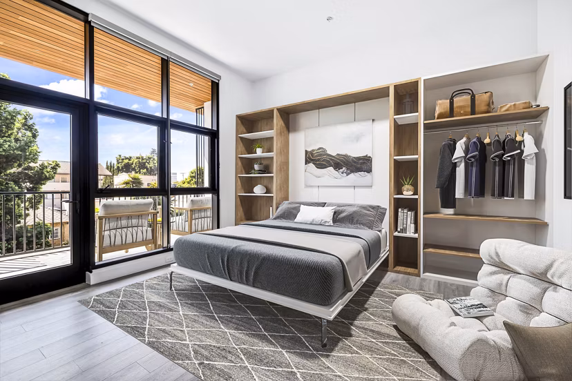 Studio bedroom living room with modern furnishings at Edendale Crossing Apartments