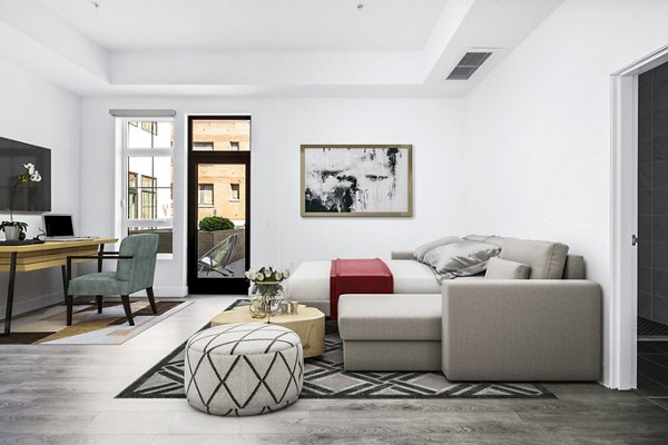Studio bedroom/home office with modern furnishings at Edendale Crossing Apartments in a vibrant location