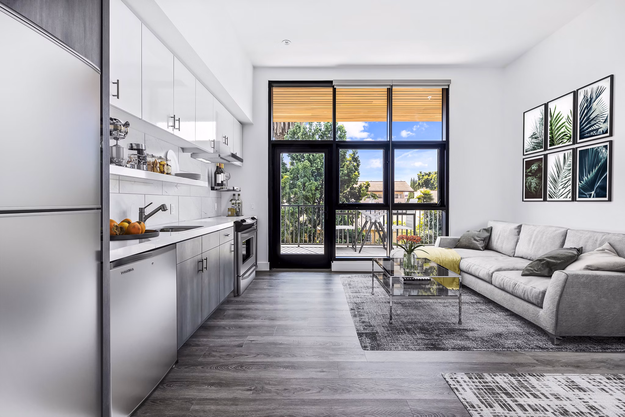 Modern living room with sleek furnishings and natural light at Edendale Crossing Apartments