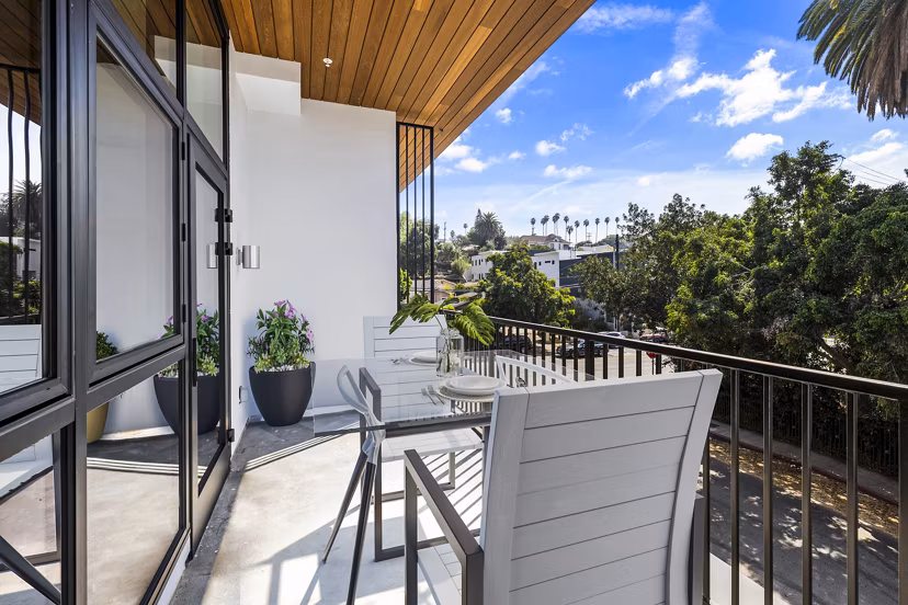 Private patio with modern seating at Edendale Crossing Apartments, offering a serene outdoor space for relaxation and leisure activities