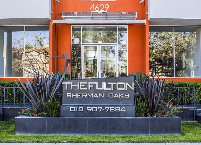 The Fulton Apartments: Elegant building showcasing modern design in vibrant city center