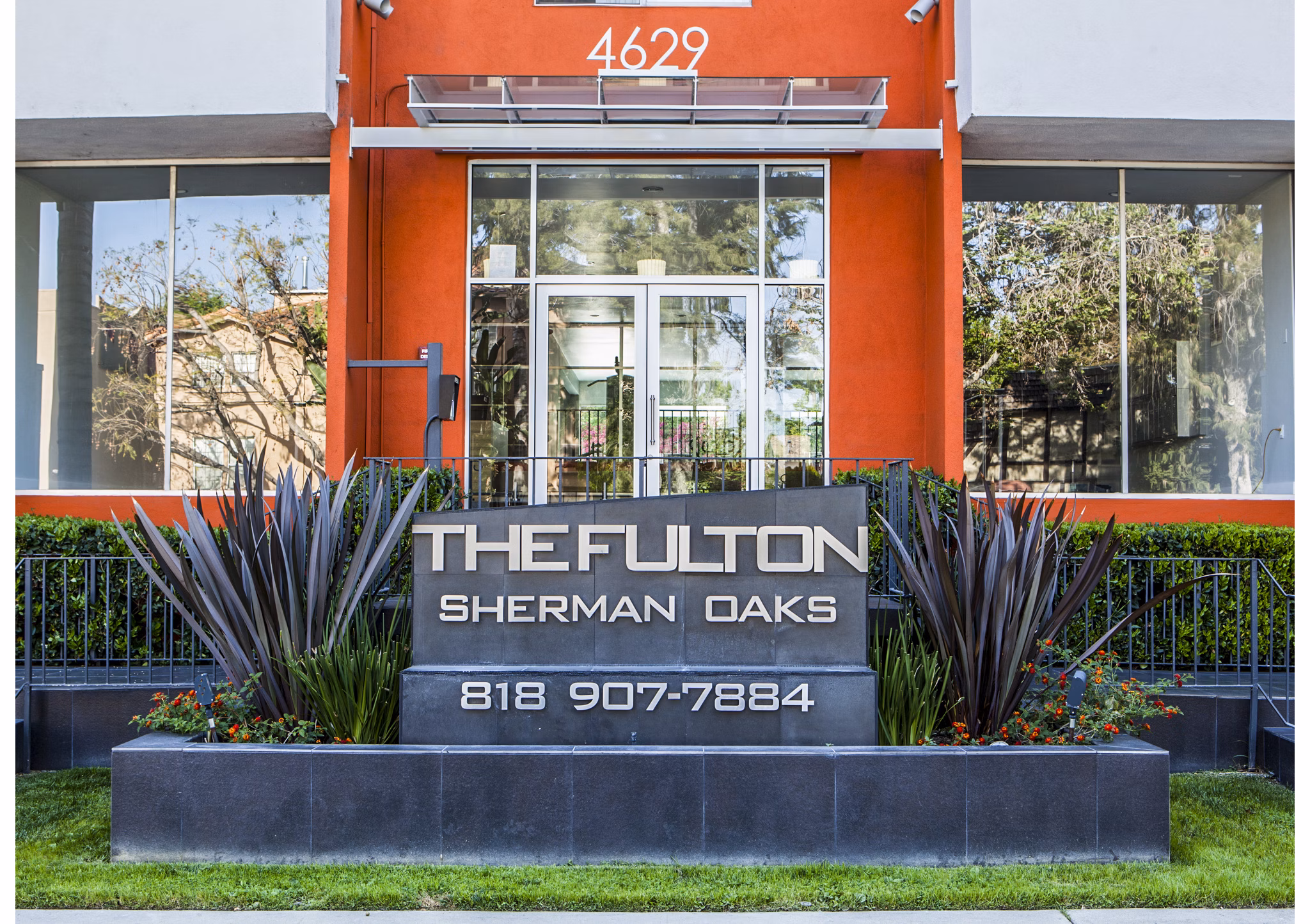 The Fulton Apartments: Elegant building showcasing modern design in vibrant city center